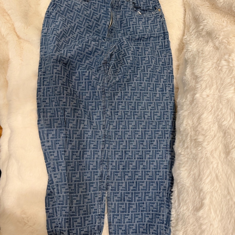 Authentic Fendi denim jeans featuring the iconic FF monogram print